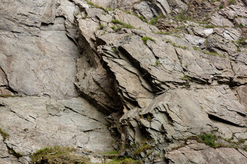 Natural texture. Rock made of gray granite stone, marble