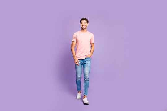Full Length Body Size View Of His He Nice Attractive Cheerful Cheery Content Guy Wearing Pink Tshirt Strolling Walking Isolated On Violet Purple Lilac Pastel Color Background