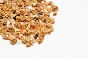 Granola with fruits and nuts. Baked muesli mix. Super food concept. Breakfast cereals. Kids diet. White isolation background.