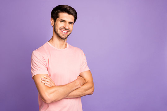 Portrait of his he nice attractive handsome cheerful cheery content bearded guy freelancer wearing pink tshirt folded arms isolated over violet purple lilac pastel color background