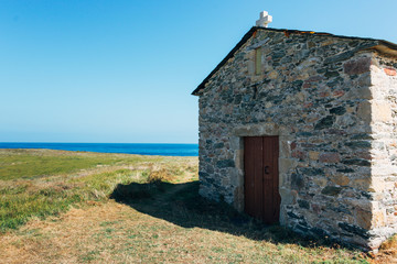 view of the ocean from the medieval stone hermitage on the coast