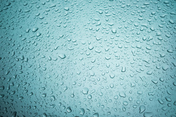 Water droplets on the surface of metal