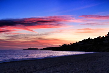 Naklejka na ściany i meble Sunset on Isla Plana beach in Cartagena, Murcia