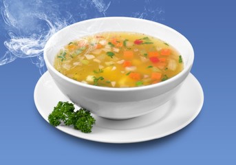 Bowl of delicious vegetables soup on  table