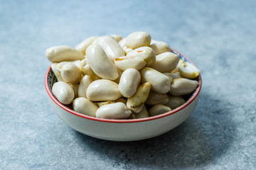 Organic Raw Unsalted White Peanuts in Bowl.