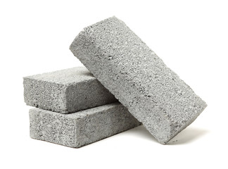 Gray cement solid brick isolated on a white background 