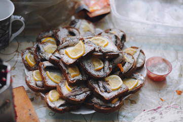 Sandwich, a traditional Ukrainian appetizer of bread with lemon and sprats