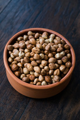 Roasted Macadamia Nuts in Stew Pot.