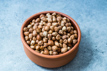 Roasted Macadamia Nuts in Stew Pot.