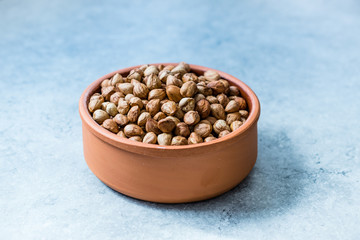 Roasted Macadamia Nuts in Stew Pot.
