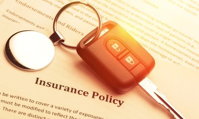 Key form car on Newspaper backdrop texture