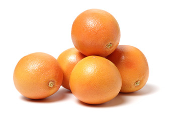 Grapefruit with segments on a white background 
