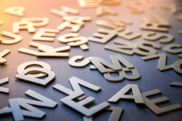 Mixed letters pile closeup photo