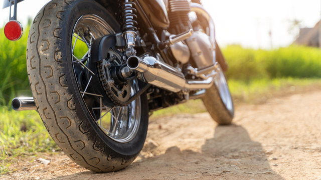 motorcycle in a sunny motorbike on the road riding.copyspace for your individual text. with warm light. © PIPAT