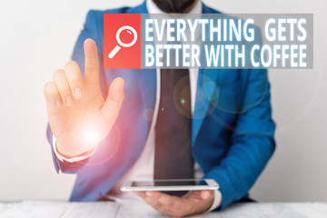 Writing note showing Everything Gets Better With Coffee. Business concept for Have a hot drink when having problems Businessman with pointing finger in front of him