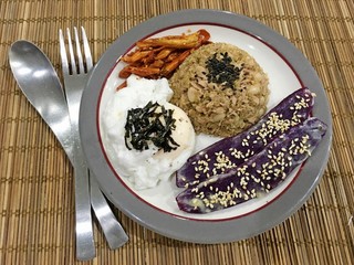 Quinoa mixed tuna salad and Poached egg and Purple Potato Baked with Truffles butter and baked chili
