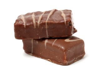 Chocolate peanut candy on white background