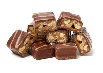 Chocolate peanut candy on white background