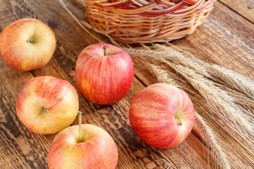 Apples close-up over the wooden natural background