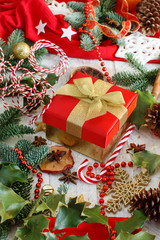 Christmas decorations with fir branches and gift box