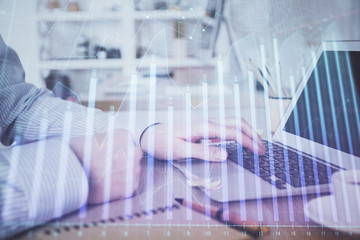 Multi exposure of stock market chart with man working on computer on background. Concept of financial analysis.