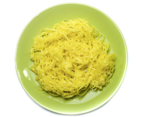 yellow noodles on dish isolated on white background