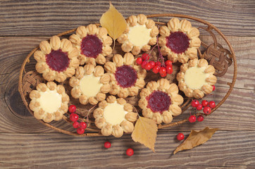 Cookies, autumn leaves and berries