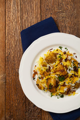 Biryani with chicken. Traditional Indian dish of rice and chicken marinated in spices and yoghurt.