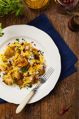 Biryani with chicken. Traditional Indian dish of rice and chicken marinated in spices and yoghurt.