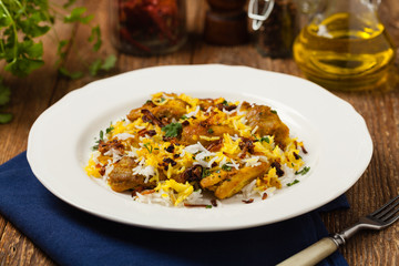 Biryani with chicken. Traditional Indian dish of rice and chicken marinated in spices and yoghurt.