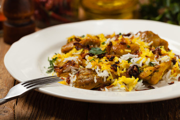 Biryani with chicken. Traditional Indian dish of rice and chicken marinated in spices and yoghurt.