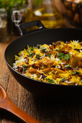 Biryani with chicken. Traditional Indian dish of rice and chicken marinated in spices and yoghurt.