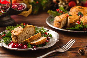 Small, baked patties in Christmas retro styling. Front view. Natural wooden background.