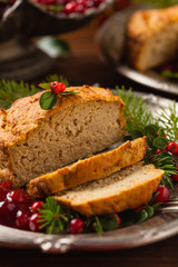 Small, baked patties in Christmas retro styling. Front view. Natural wooden background.