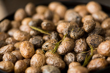 Close up of freshly cooked mushrooms on big plate for sale