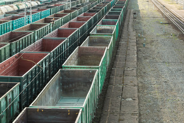 Freight cars at a large railway station. Cargo transportation and railway trains