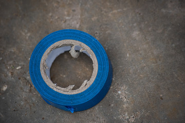 Blue electrical tape on a rough surface