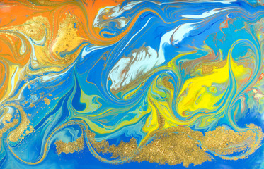 Fototapeta na wymiar Blue and yellow marble pattern with golden glitter. Abstract liquid background