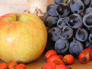 ripe apple and sweet grapes