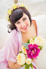 beautiful bride with bouquet of flowers