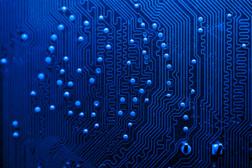 Blue themed circuit board close-up