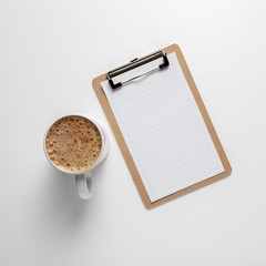 Top view clipboard with coffee mug