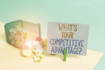 Word writing text What S Your Competitive Advantage Question. Business photo showcasing Marketing strategy Plan Trash bin crumpled paper clothespin empty reminder office supplies tipped