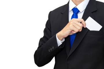 Business man who takes out white card from the pocket black suit. Isolated on white background. copy space. 