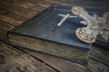 exorcism book on wooden floor