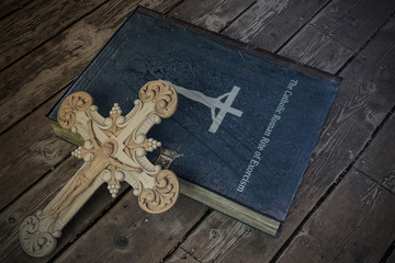 exorcism book on wooden floor