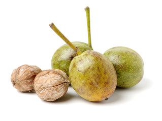 Ripe Broken Walnuts on white background