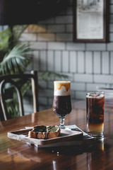 cup of coffee on wooden table
