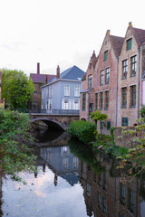 Fototapeta na wymiar Romantic houses along the river canal in the old city of Europe