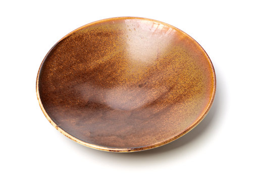 Empty Brown Earthenware Plate On White Background